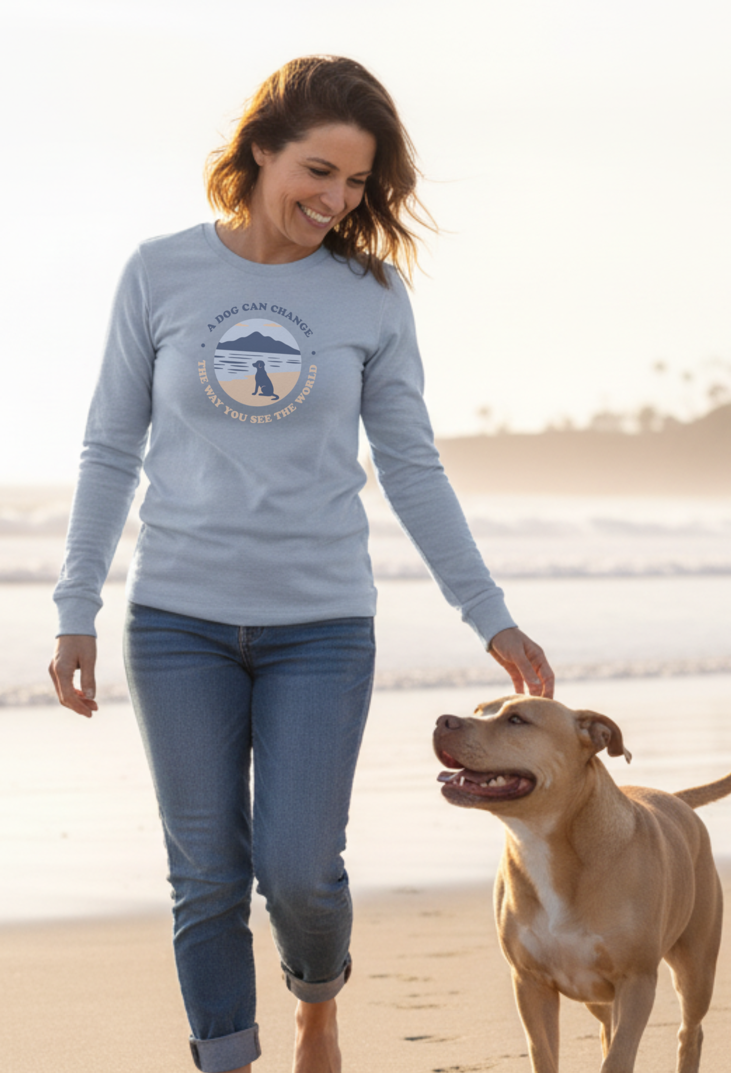 dog and woman at beach